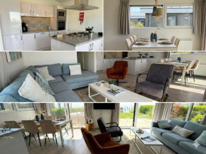 Heller, moderner Wohn- und Essbereich mit offener Küche, Sofa, Sesseln und großen Fenstern mit Blick ins Grüne. - Villa Sea Side