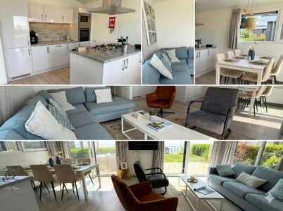 Heller Wohn- und Essbereich mit offener Küche, Sofa und Esstisch in der Villa Sea Side.
